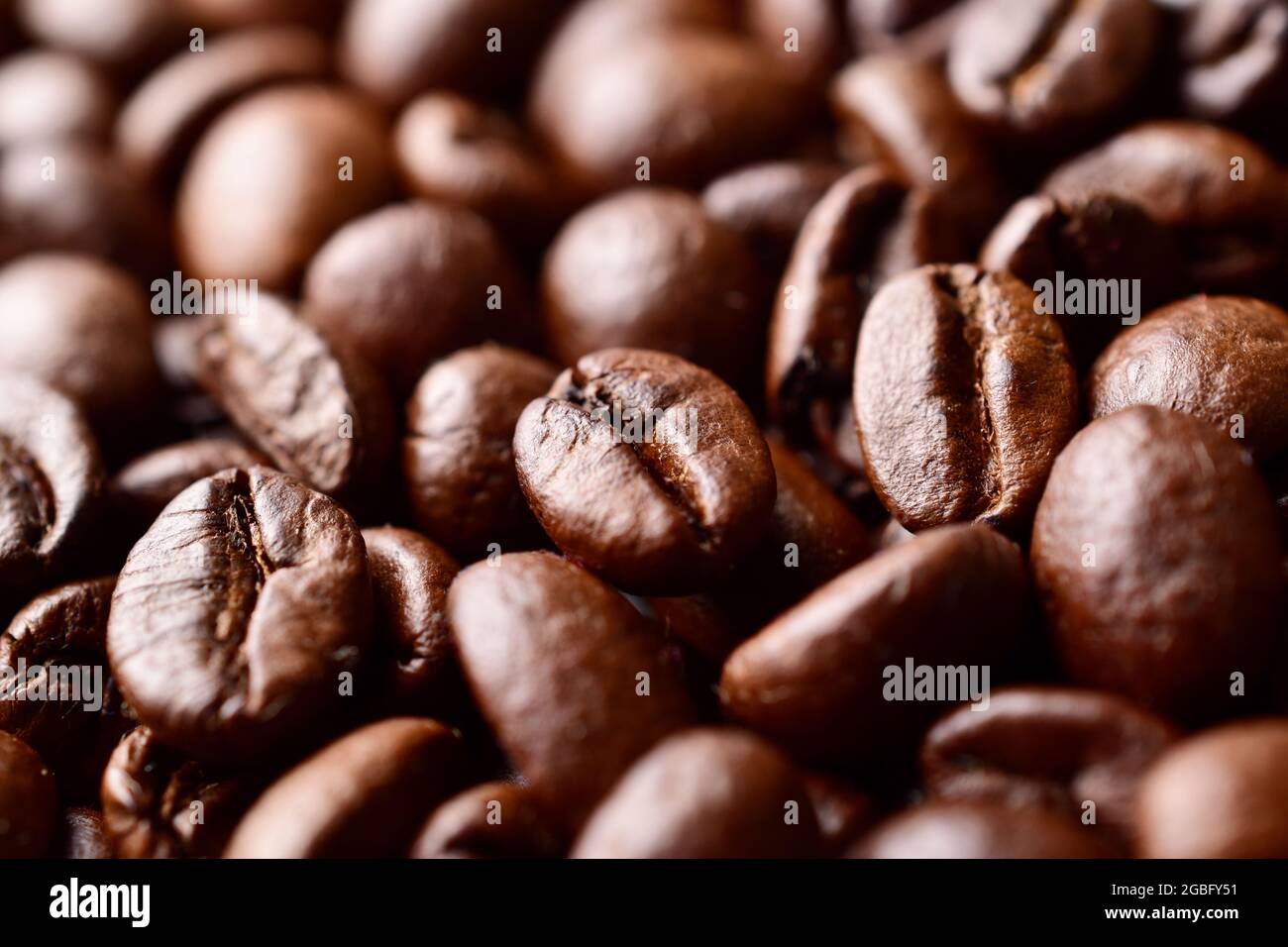 macro image of roasted coffee bean background Stock Photo - Alamy