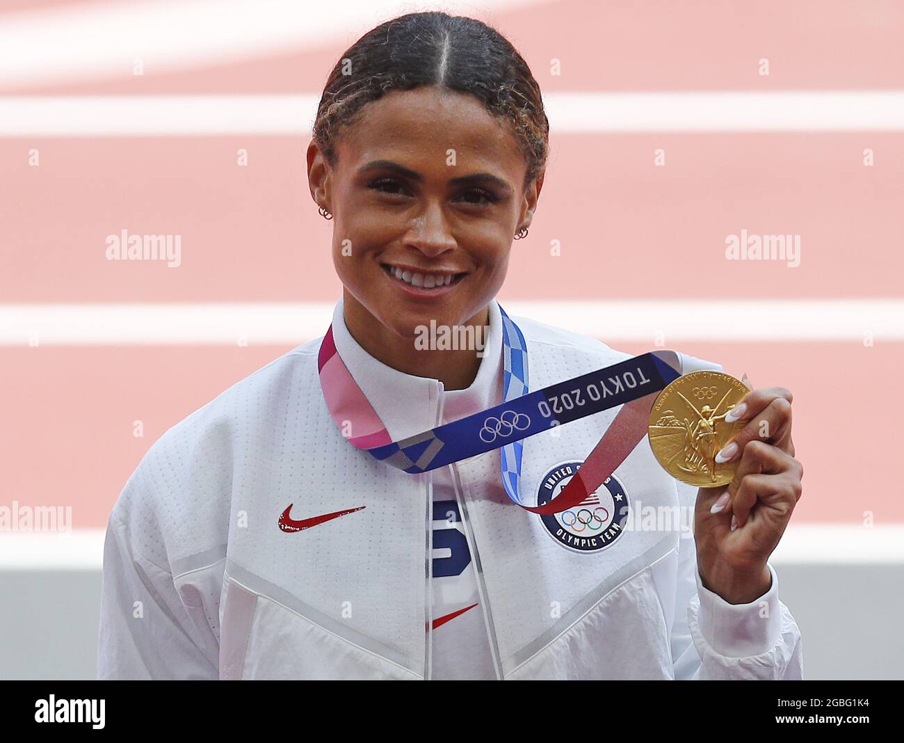 Tokyo, Japan. 04th Aug, 2021. Gold medalist Sydney McLaughlin of the USA poses on the podium after winning the Women's 400m Hurdles Finals with a new world record time of 51.46 at the Athletics competition during the Tokyo Summer Olympics in Tokyo, Japan, on Wednesday, August 4, 2021. Photo by Bob Strong/UPI Credit: UPI/Alamy Live News Stock Photo