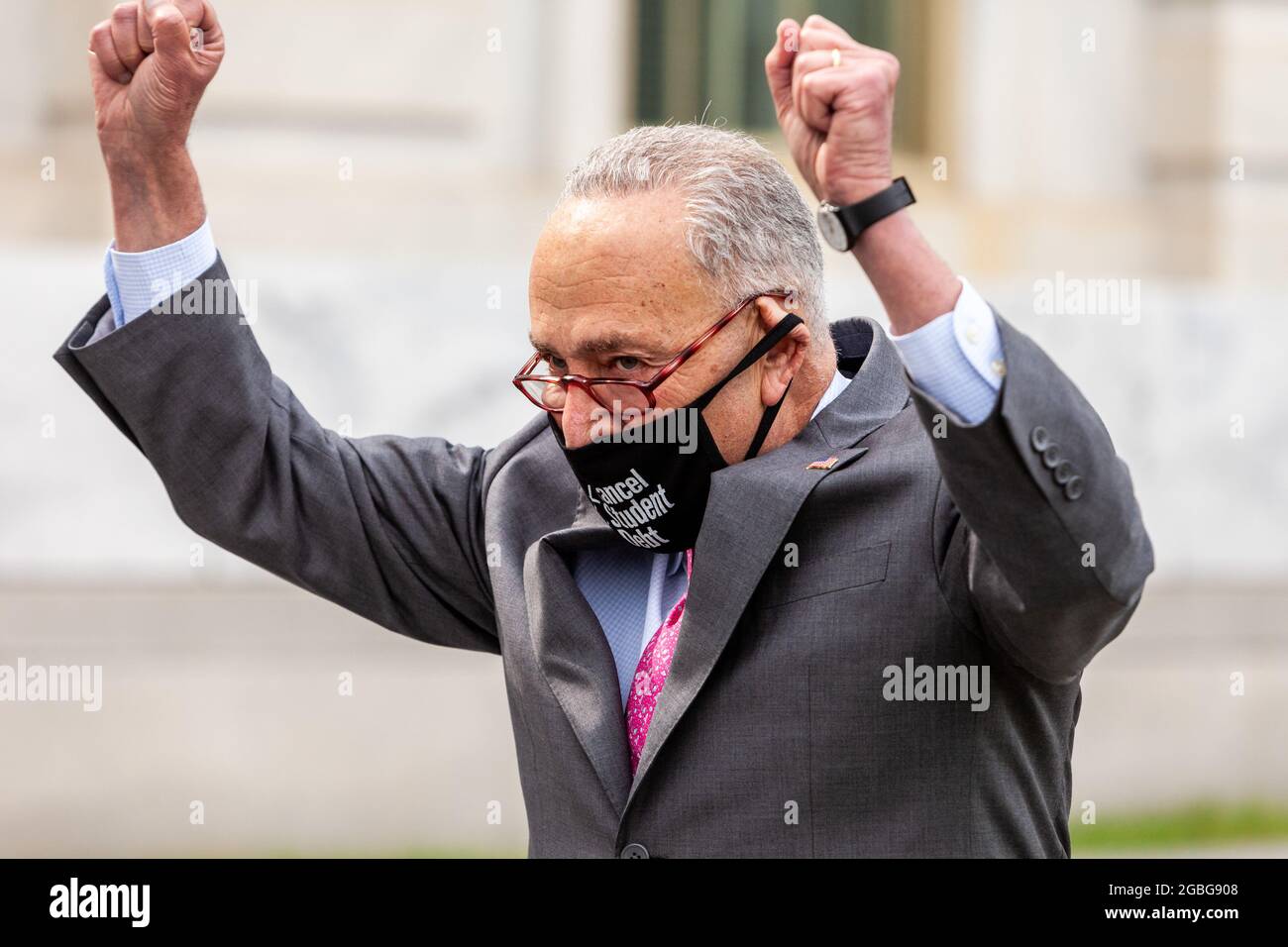 Washington, DC, USA, 3 August 2021.  Pictured: Senate Majority Leader Chuck Schumer (D-NY) celebrates as he arrives to deliver good news to Congresswoman Cori Bush (D-MO): her protest against the end of the pandemic eviction moratorium on the Capitol steps has succeeded. Credit: Allison Bailey / Alamy Live News Stock Photo