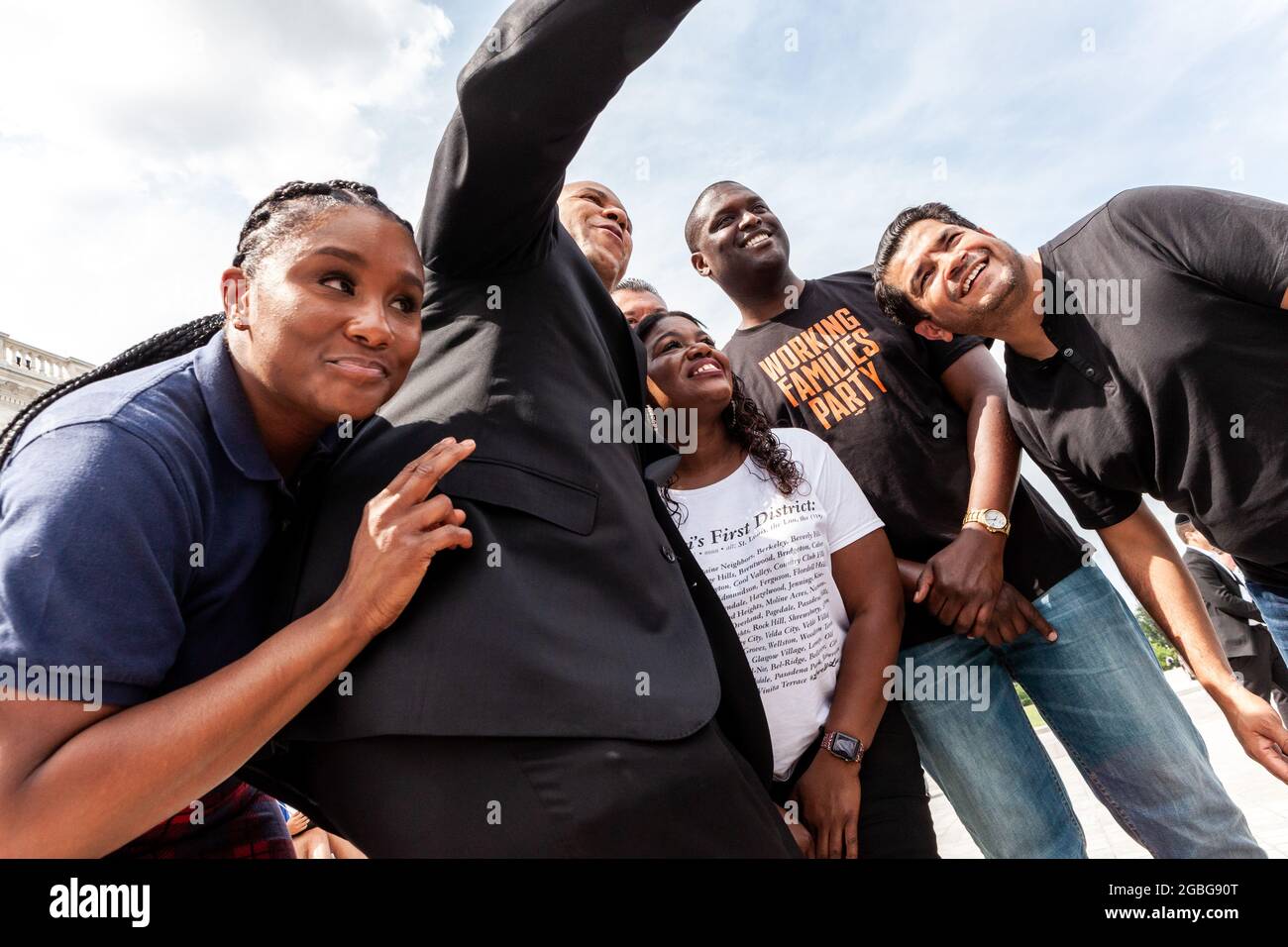 Washington, DC, USA, 3 August 2021.  Pictured: Congresswoman Cori Bush (D-MO) takes a selfie with Senators Cory Booker (D-NJ) and Alex Padilla (D-CA), Missouri state representative Raychel Proudie (D), and supporters.  Congresswoman Bush has been at the Capitol protesting the expiration of the pandemic moratorium on evictions since it ended at midnight August 1.  From left: Raychel Proudie, Cory Booker, Cori Bush, Alex Padilla (back).  Credit: Allison Bailey / Alamy Live News Stock Photo