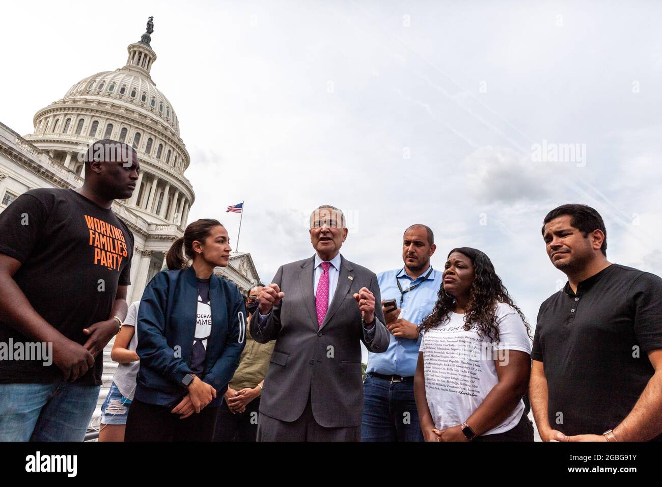 Washington, DC, USA, 3 August 2021.  Pictured: Senate Majority Leader Chuck Schumer (D-NY) meets with Representatives Cori Bush (D-MO), Alexandria Ocasio-Cortez (D-NY), and Mondaire Jones D-NY) to congratulate Bush because her protest against the pandemic eviction moratorium on the Capitol steps has succeeded.  Credit: Allison Bailey / Alamy Live News Stock Photo