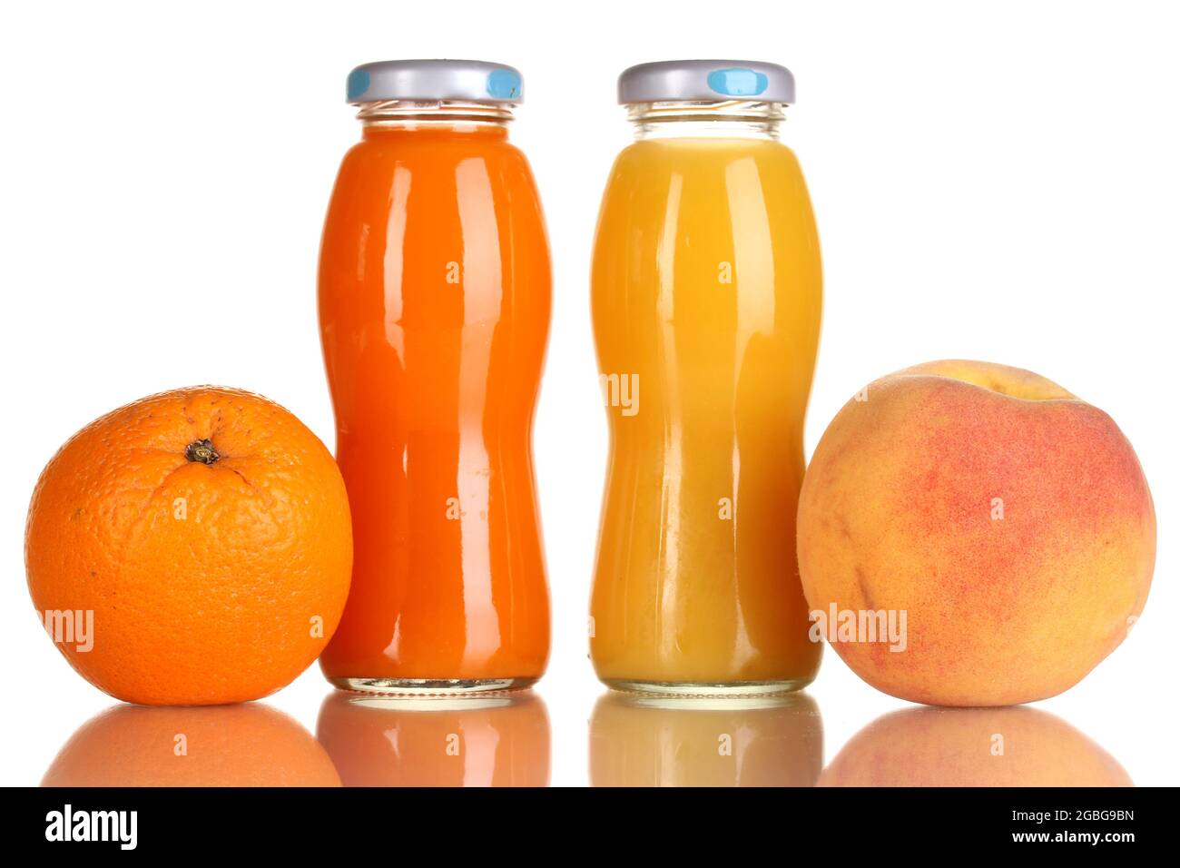 Delicious orange and peach juice in bottle and orange and peach next to
