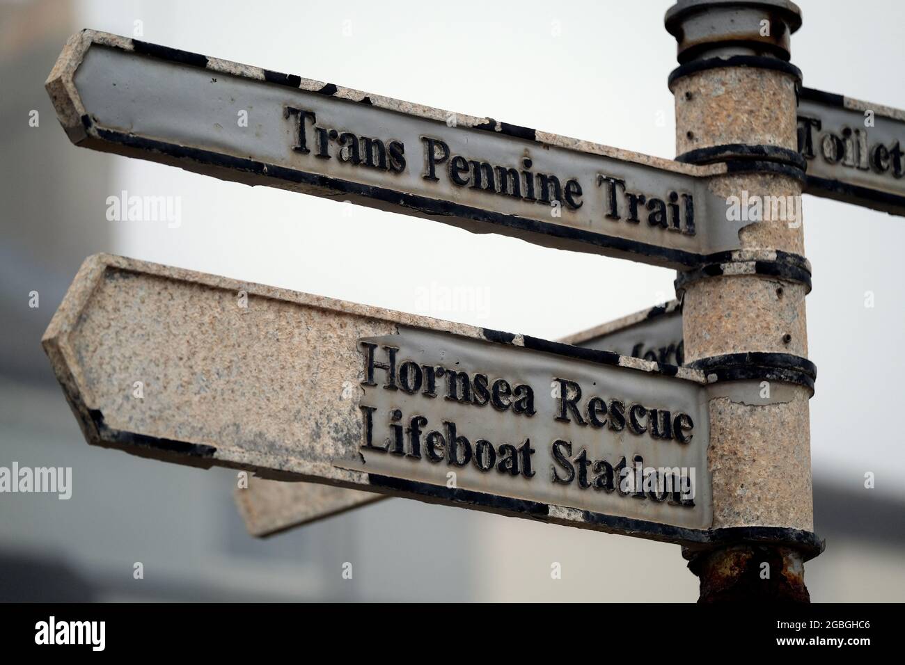 Old sign on Hornsea, Yorkshire, sea front indicating start of trans penine way. Stock Photo