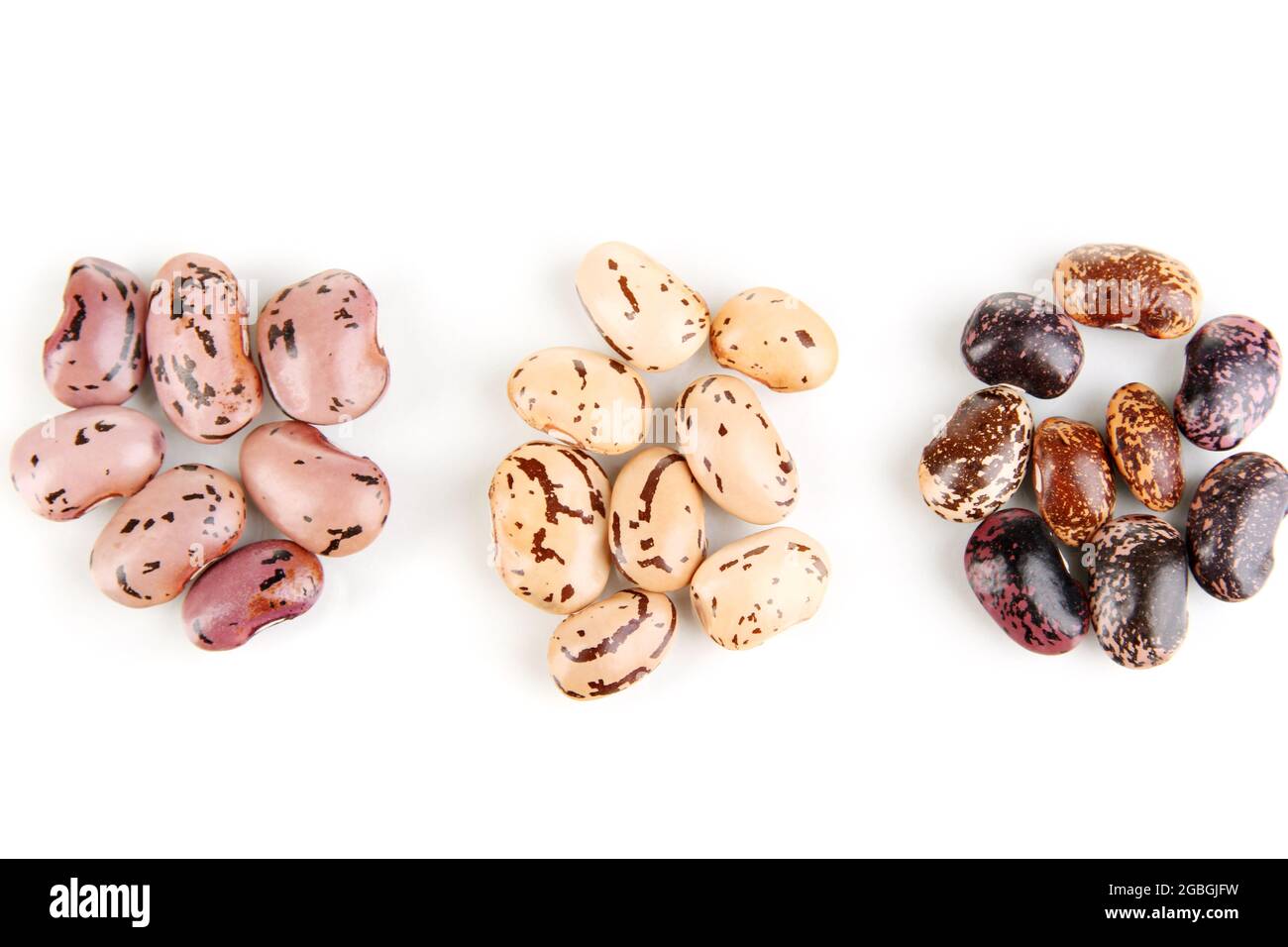 Three hill of beans isolated on white Stock Photo Alamy