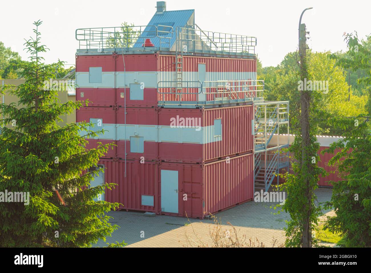 Observation tower made of metal construction containers. Premises for builders from metal containers Stock Photo