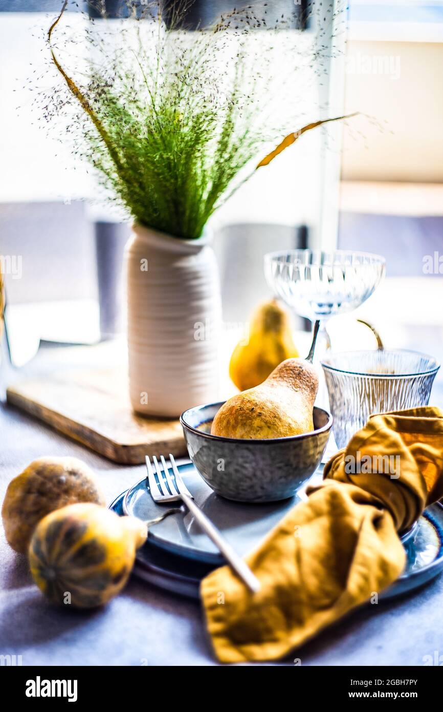 Rustic autumnal table setting with pumpkins for Thanksgiving Stock Photo