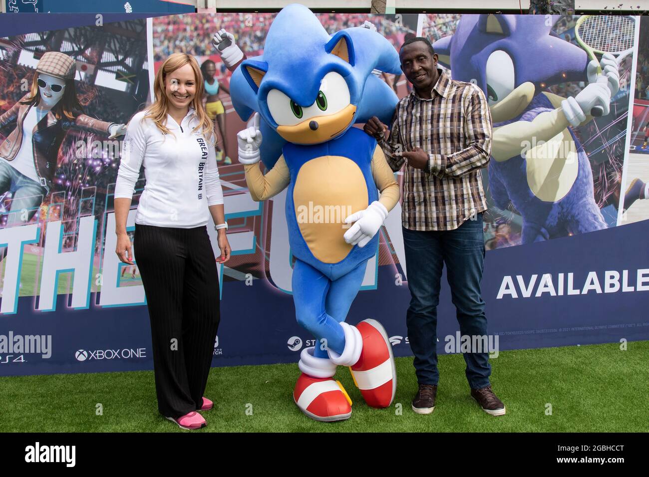 Team GB Athletes Joanna Roswell who is a double Olympic gold medalist in cycling and Linford Christie who is a gold and sliver medalist in sprinting, launch the Official Olympic game with the help of Sonic The Hedgehog at Team GB Fanzone at Westfield White City, West London, UK. Stock Photo