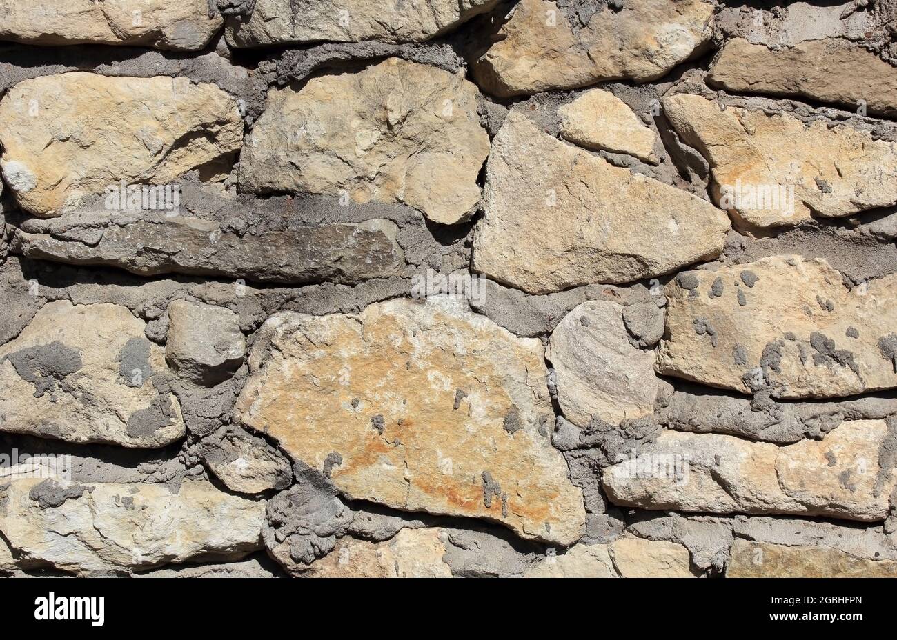 Stone Building Rough Texture Textured surface of rough stone wall Stock Photo - Alamy