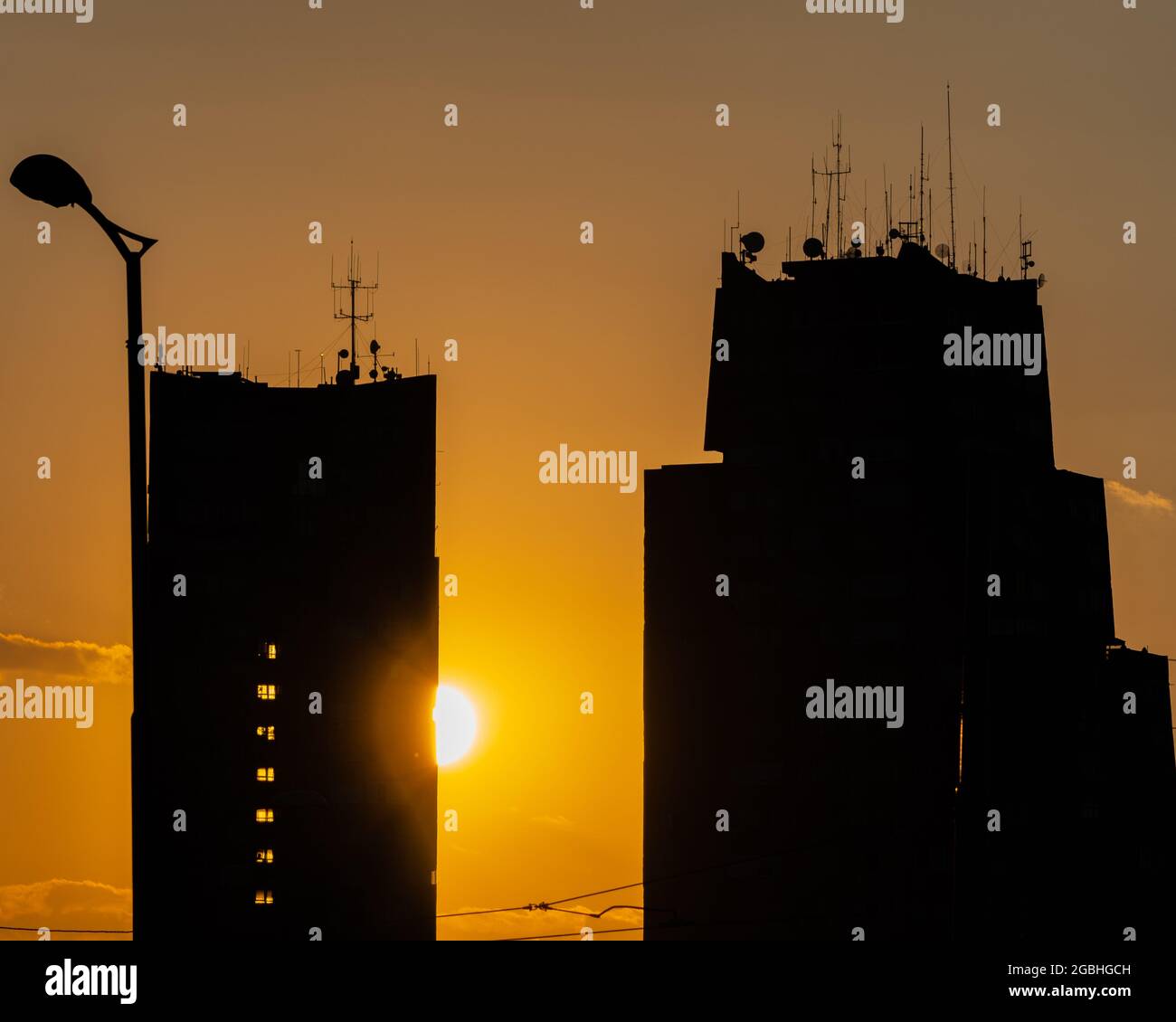 Silhouettes two high rise hi-res stock photography and images - Alamy