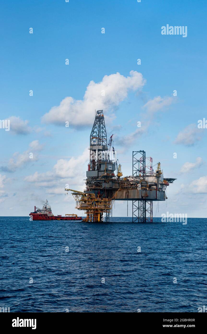 offshore platform at sea with beautiful sky and calm sea Stock Photo