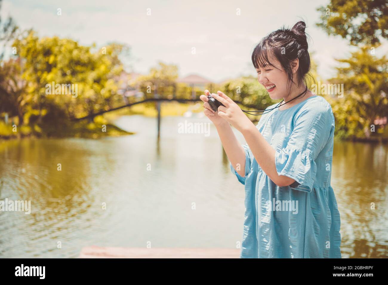 Asian Girl Feeling Happy At The Lake Stock Photo, Picture and Royalty Free  Image. Image 41066666.