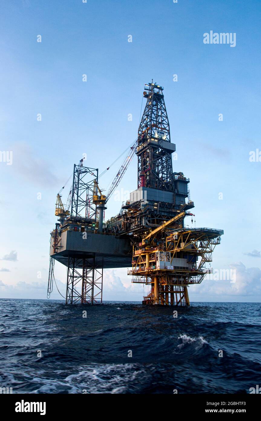 offshore platform at sea with beautiful sky and calm sea Stock Photo