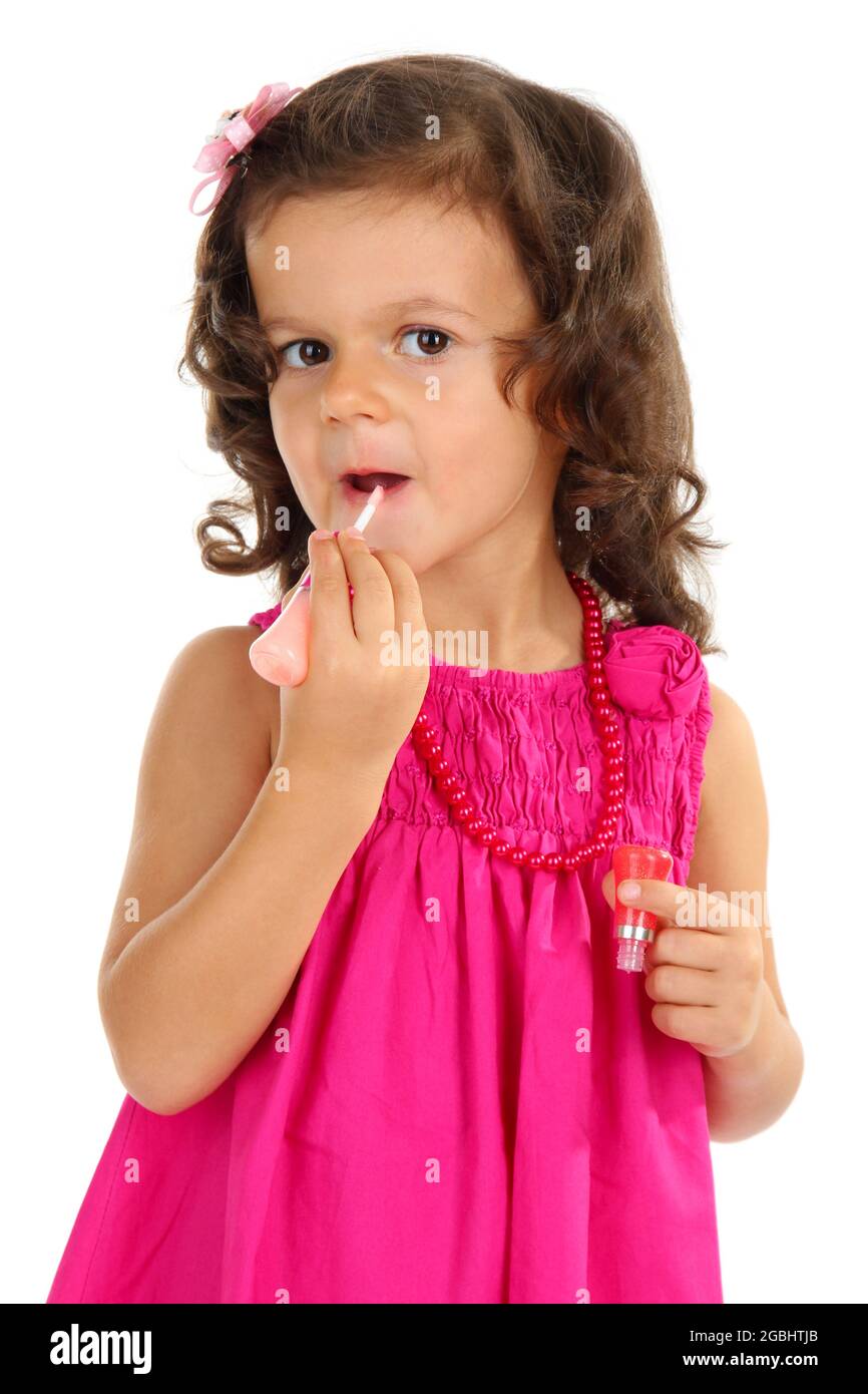 beautiful little girl doing makeup isolated on white Stock Photo Alamy