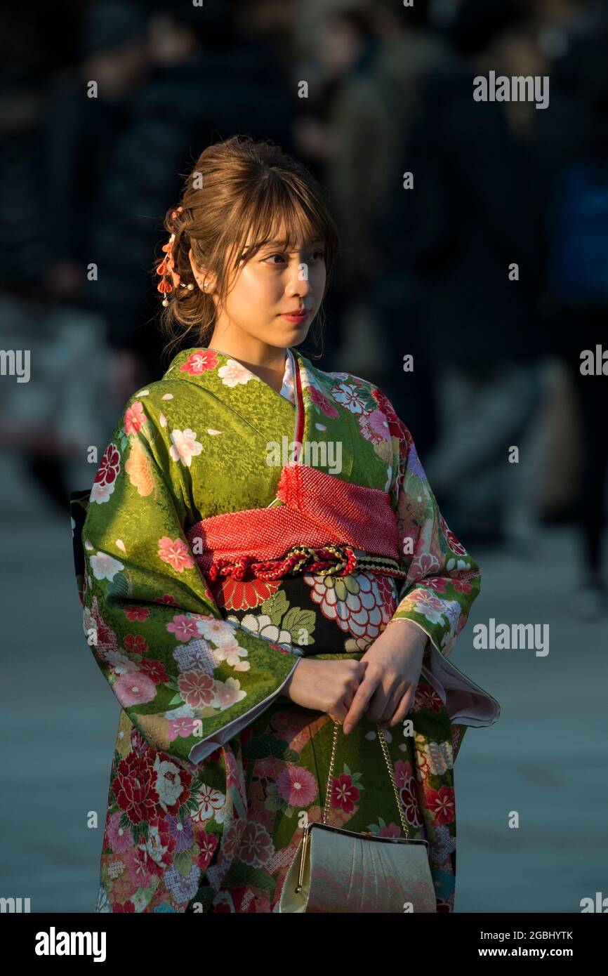 Young woman in kimono on Coming of Age Day at Meiji Shrine, Harajuku, Tokyo, Japan Stock Photo