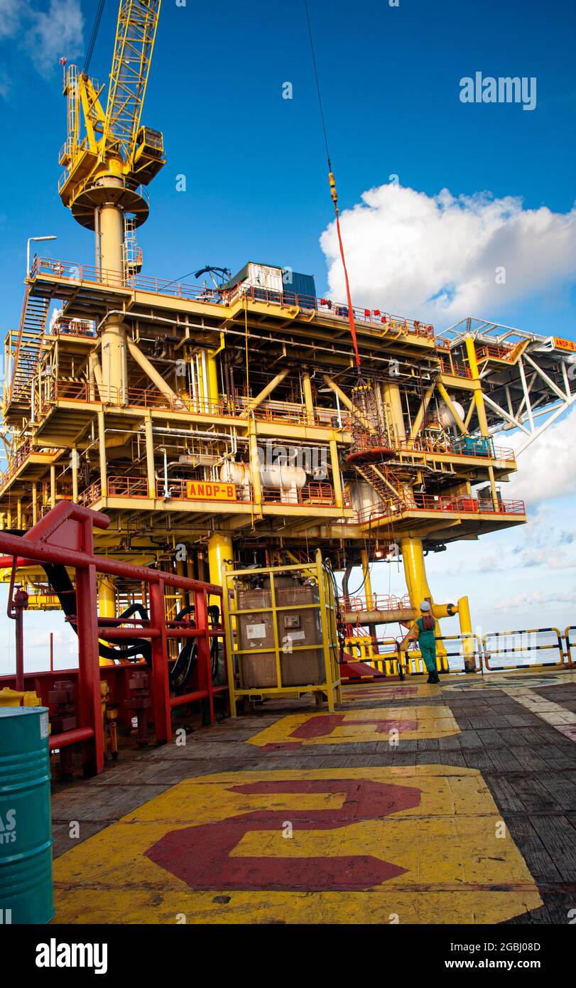 offshore platform at sea with beautiful sky and calm sea Stock Photo