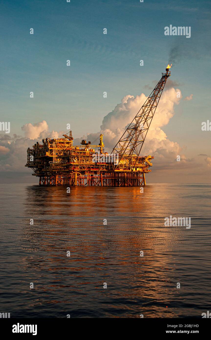 oil platform at sea with beautiful cloud during sunset at south china sea Stock Photo
