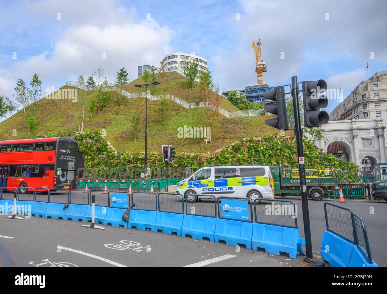 Park Lane, London, UK. 4 August 2021. The Marble Arch Mound remains