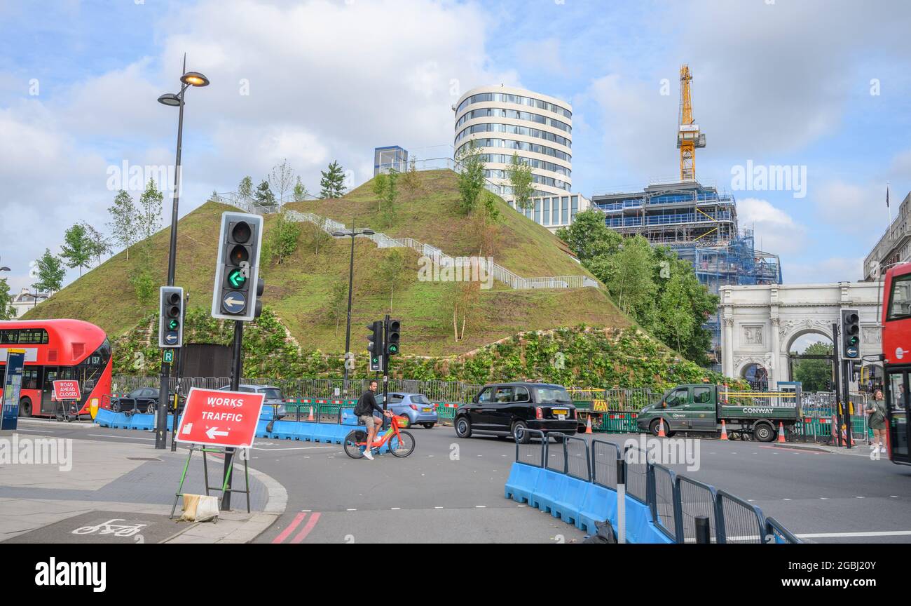 Park Lane, London, UK. 4 August 2021. The Marble Arch Mound remains