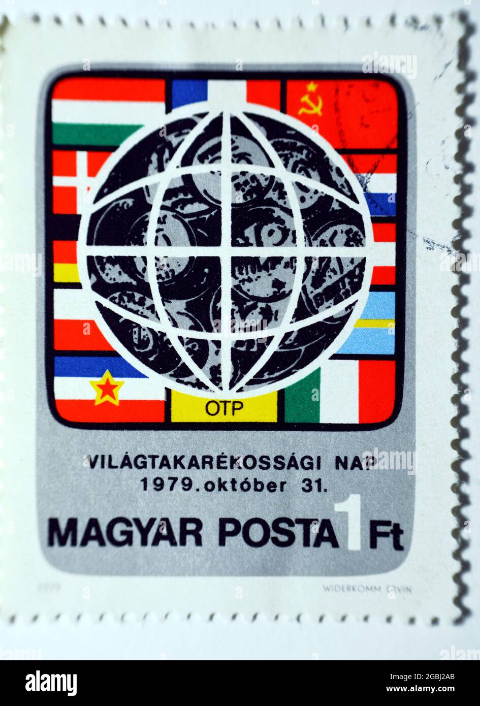A postage stamp printed in Hungary shows Earth flags dedicated to International Savings Day, Magyar Posta value 1 Ft, Savings and insurance series, ci Stock Photo