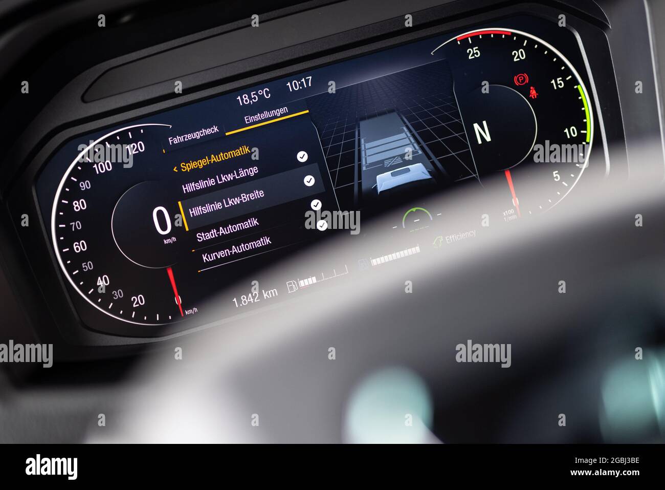 Schweitenkirchen, Germany. 04th Aug, 2021. The instrument display of a  truck shows the setting options for the truck's digital exterior mirrors  during a press event to demonstrate the digital mirror replacement system "
