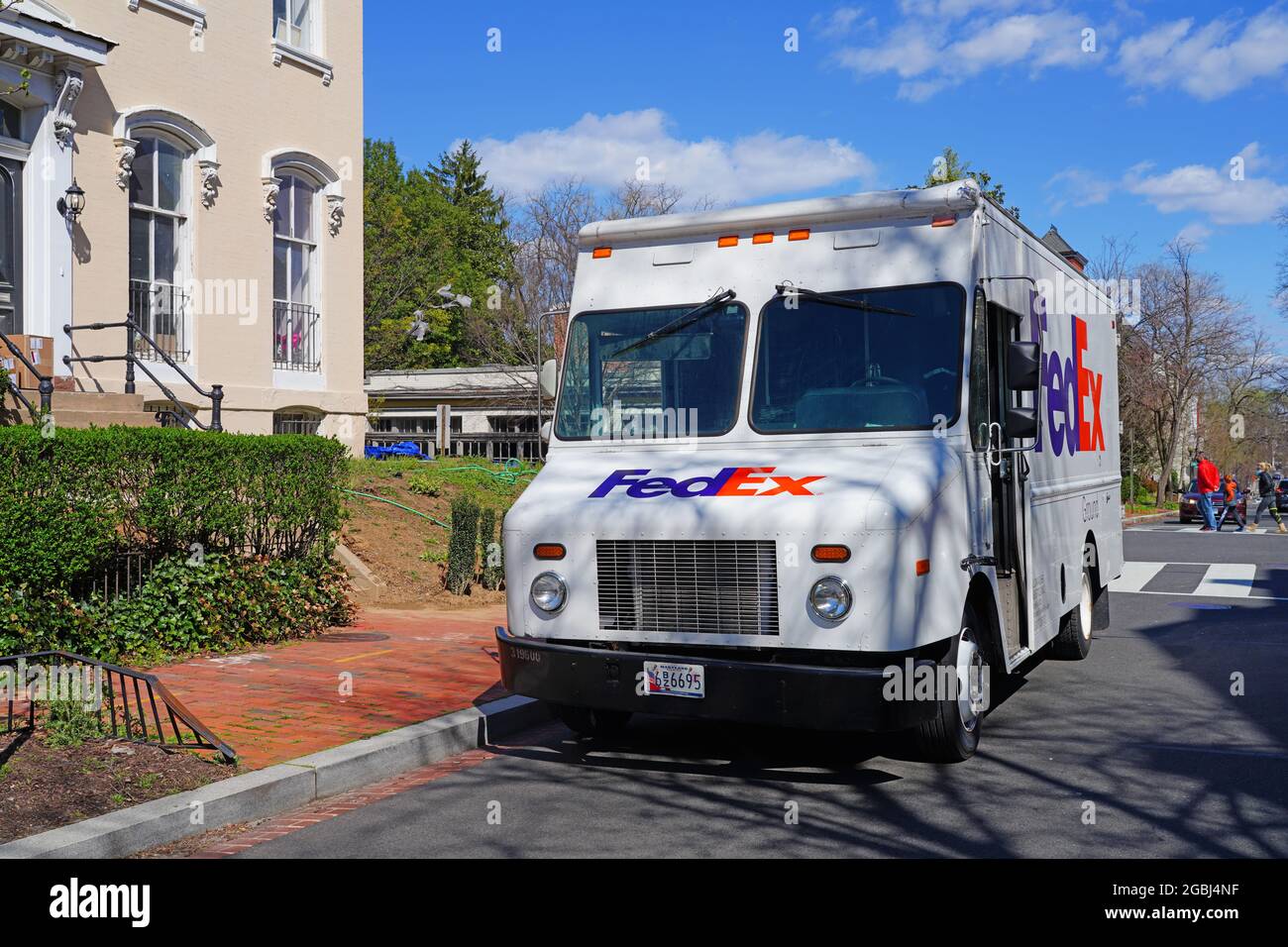 WASHINGTON, DC -2 APR 2021- View of a delivery truck from Federal Express (Fedex) parked on the street in Washington DC. Stock Photo