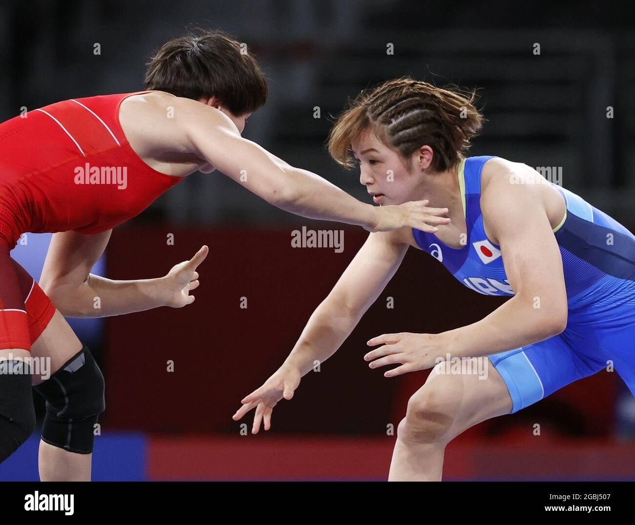 Tokyo, Japan, Aug. 4, 2021, Yukako Kawai of Japan (blue) competes in