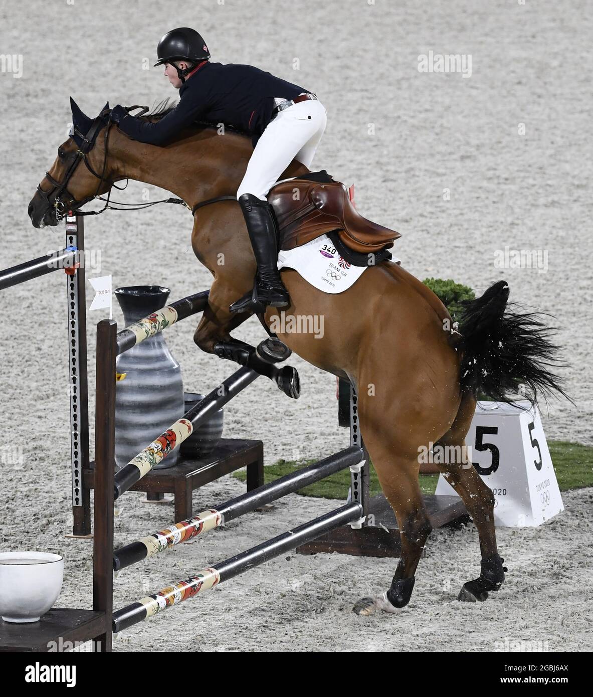 Tokyo, Japan. 04th Aug, 2021. Great Britain's Harry Charles, on Romeo 88, is sent out of the saddle as his horse crashes into the rails during the Equestrian Individual Jumping competition at the Tokyo 2020 Olympics, Wednesday, August 4, 2021 in Tokyo, Japan. Photo by Mike Theiler/UPI Credit: UPI/Alamy Live News Stock Photo