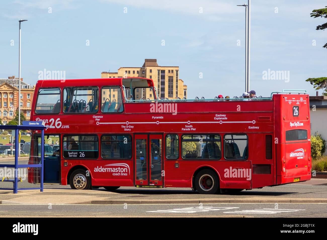 08042021 Portsmouth, Hampshire, UK An open top tour bus at a bus stop