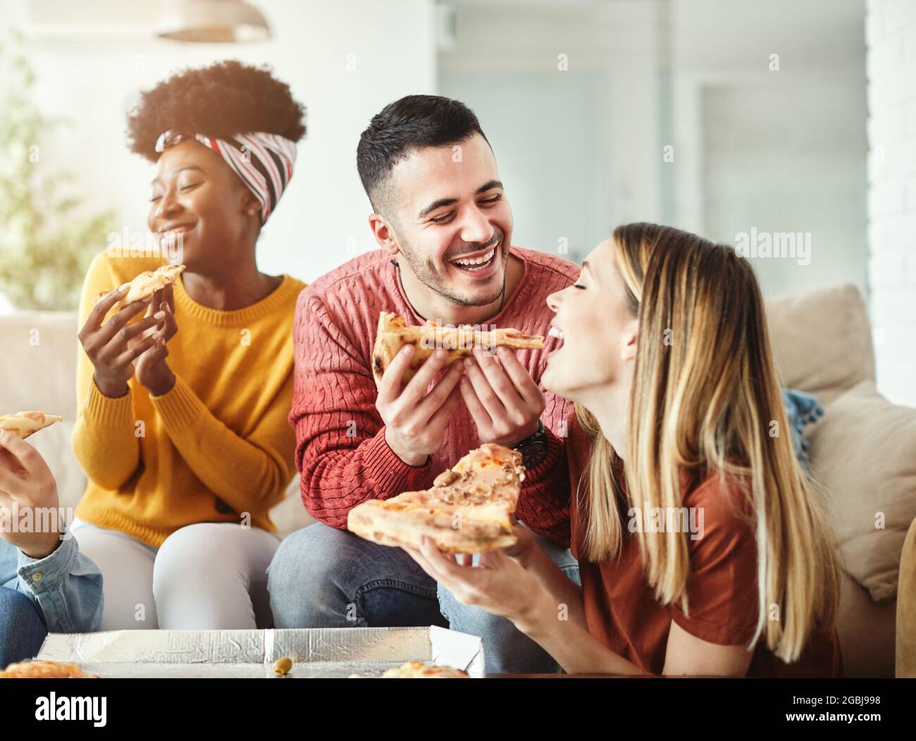 close-up image, A group of friends eating pizza in the party together. New  year party, Birthday party, Pizza party at home Stock Photo - Alamy