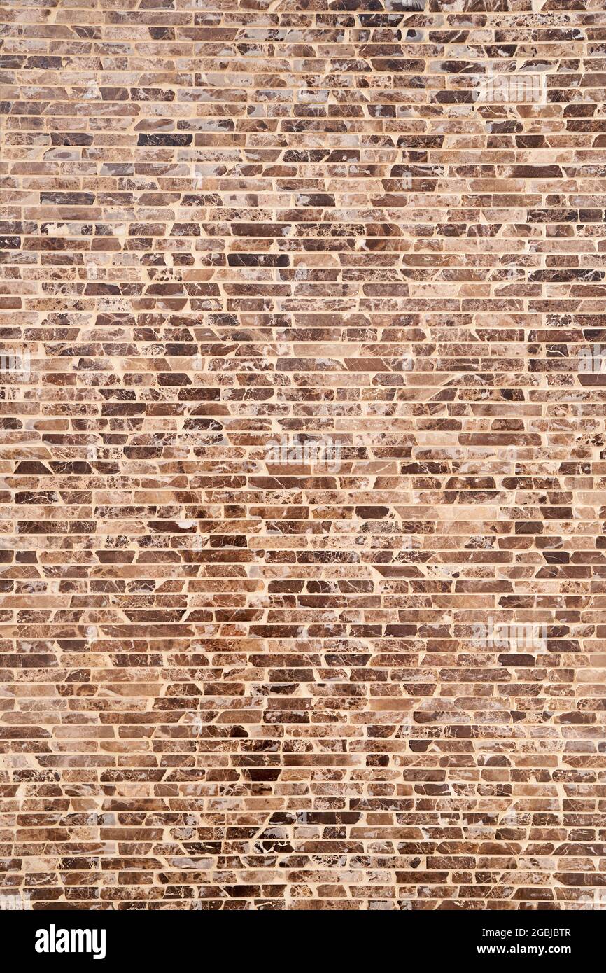 Brown and black brick wall. Close-up Stock Photo
