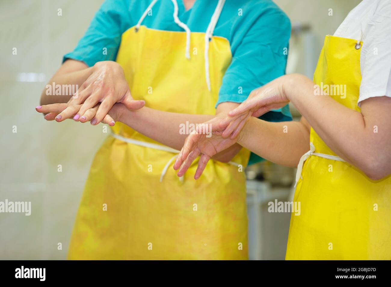 Doctors treat hands before surgery Stock Photo Alamy
