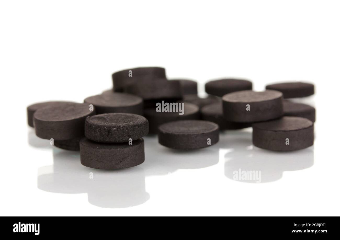 activated carbon in tablets isolated on white Stock Photo Alamy