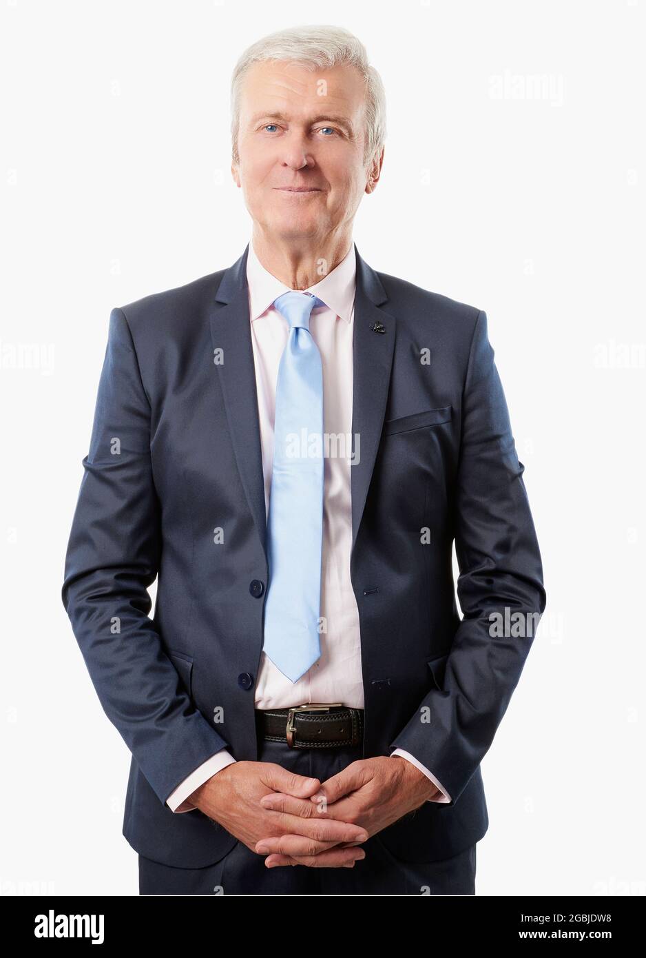 Studio portrait of a senior businessman wearing suit and tie while ...