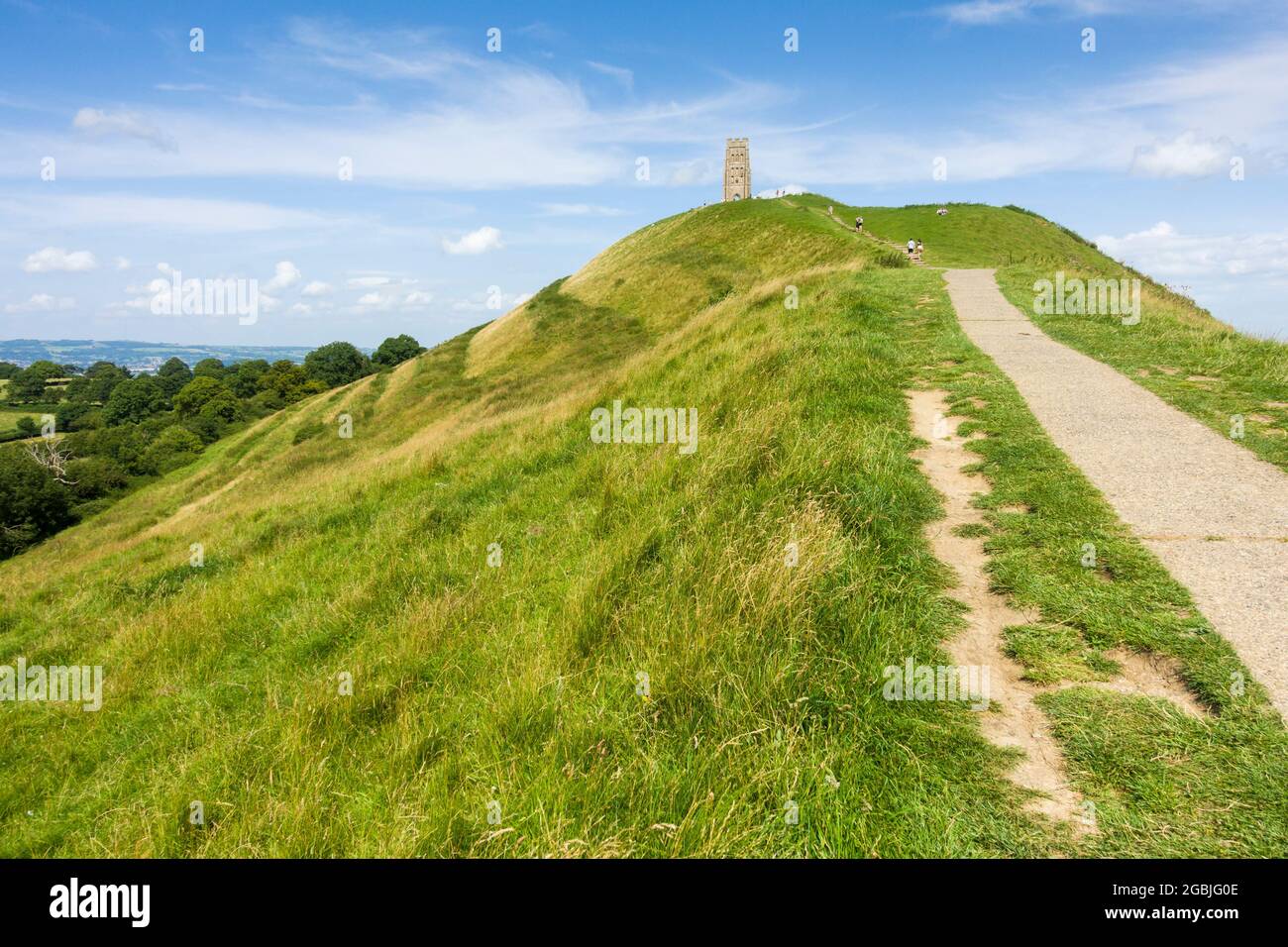 Glastonbury Tor, Somerset, UK, a National Trust site and Scheduled Ancient Monument. St Michael's Church Tower overlooking the Somerset Levels. Stock Photo