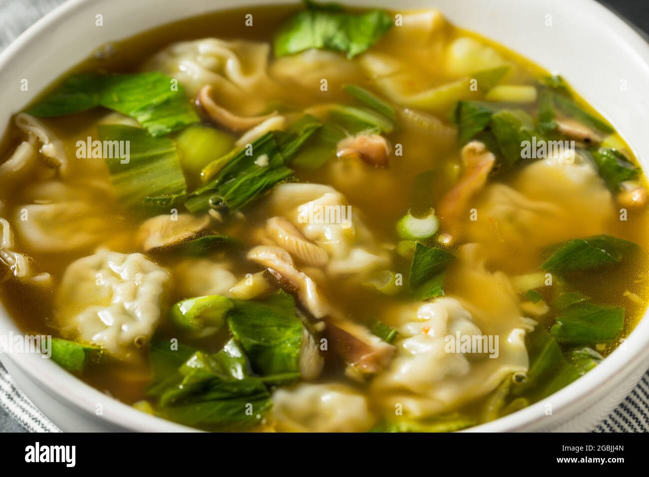 Homemade Asian Chicken Wonton Soup with Bok Choy Stock Photo Alamy