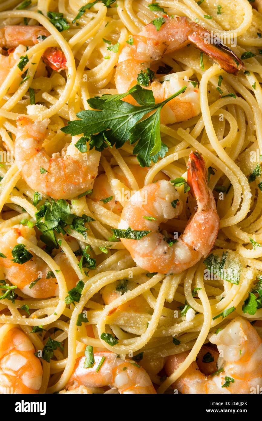 Homemade Cooked Shrimp Scampi with Pasta with Parsley Stock Photo