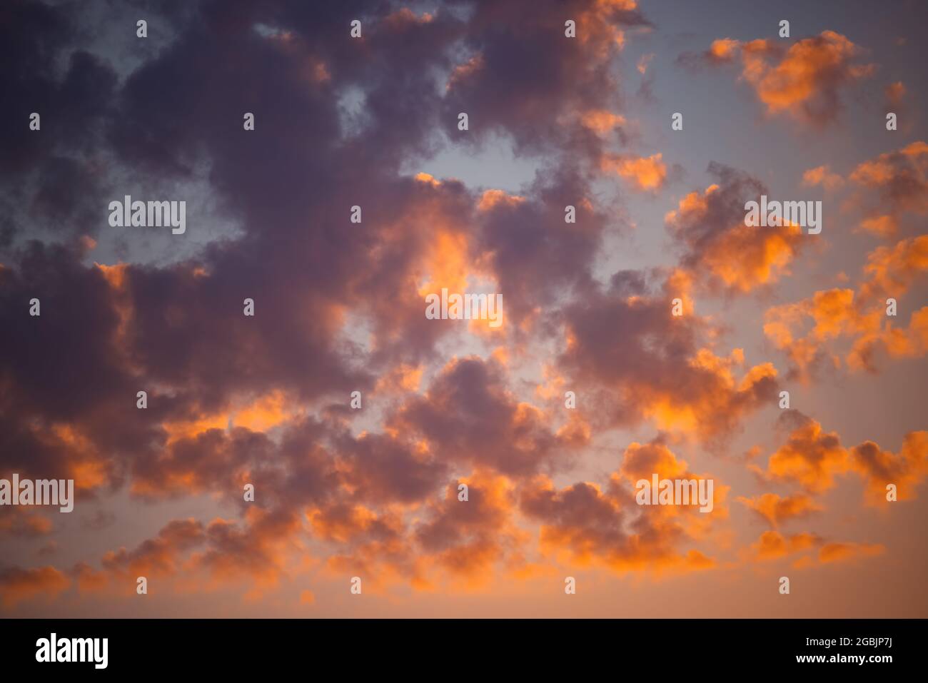 Cloudscape and dramatic blue sky, sunrise shot Stock Photo