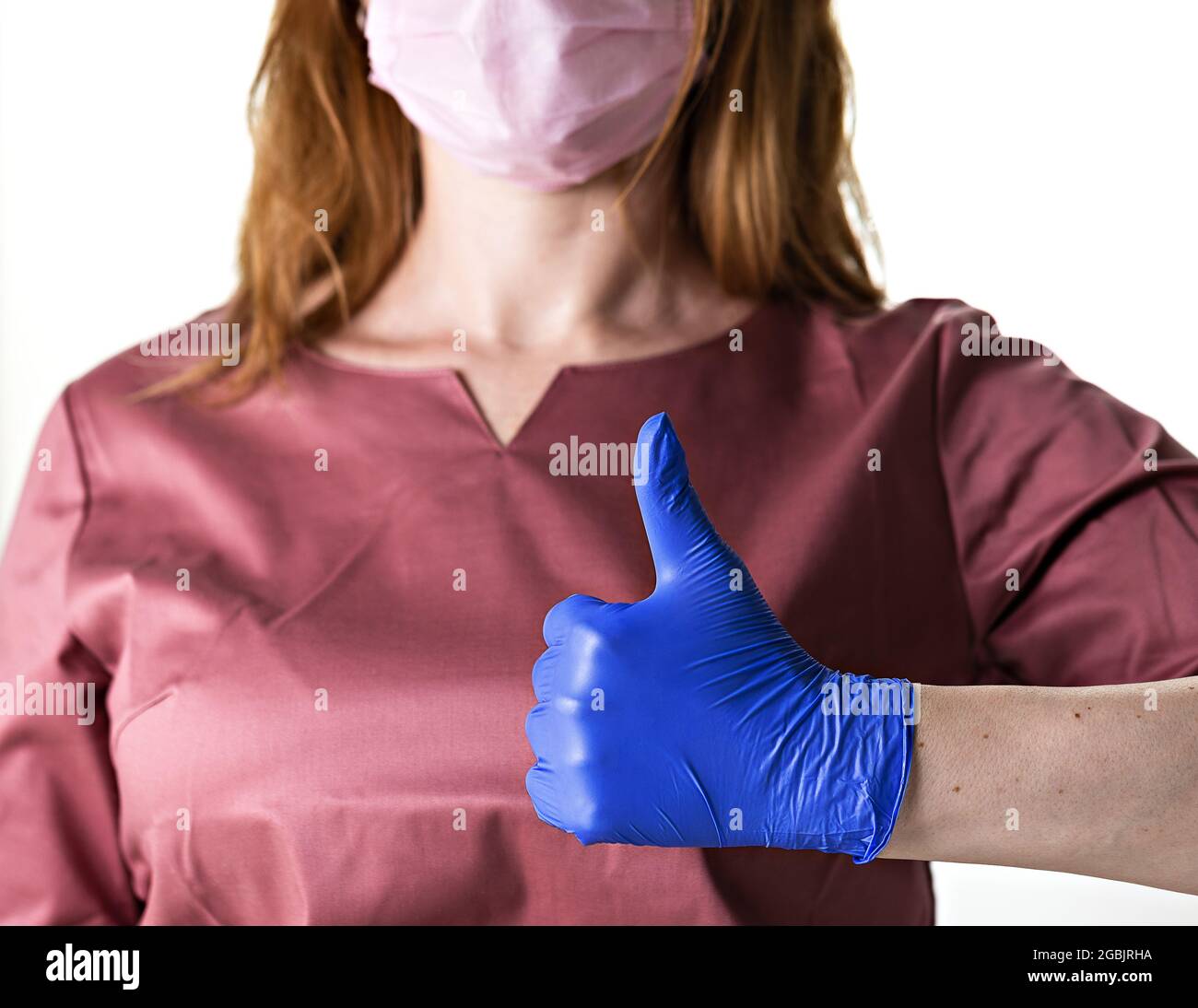 female doctor gives thumbs up. medical positive concept Stock Photo