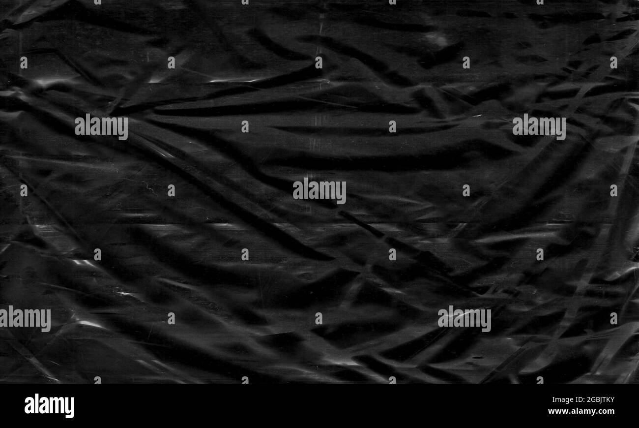 Background texture of a polyethylene,plastic transparent black plastic