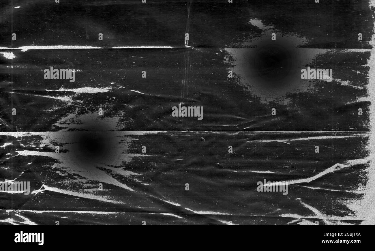 Background texture of a polyethylene,plastic transparent black plastic