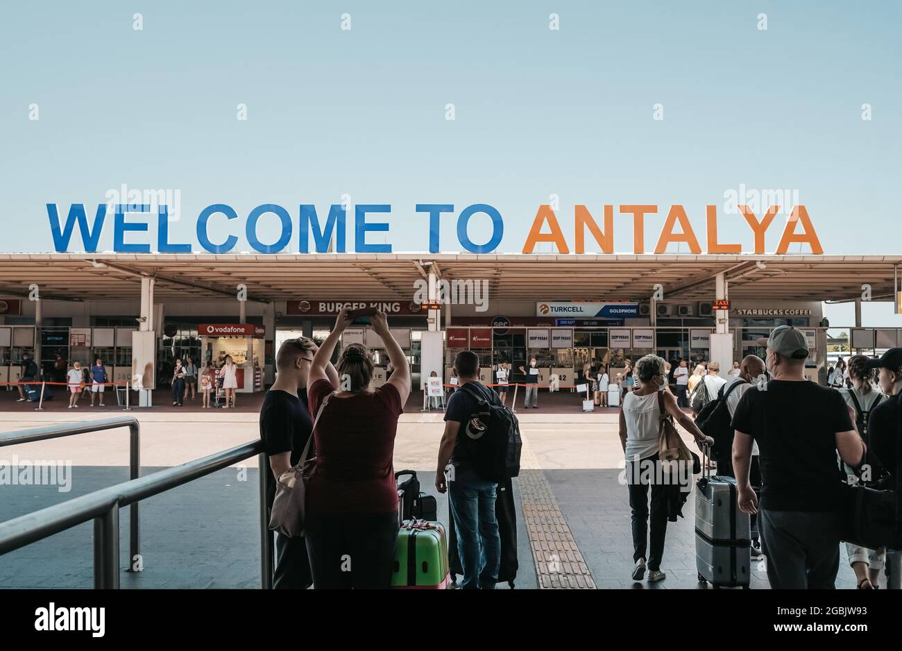 Antalya, Turkey - 4 August 2021: Vacationers and tourists arrive in Antalya resorts. Rest and travel in Turkey. High quality photo Stock Photo