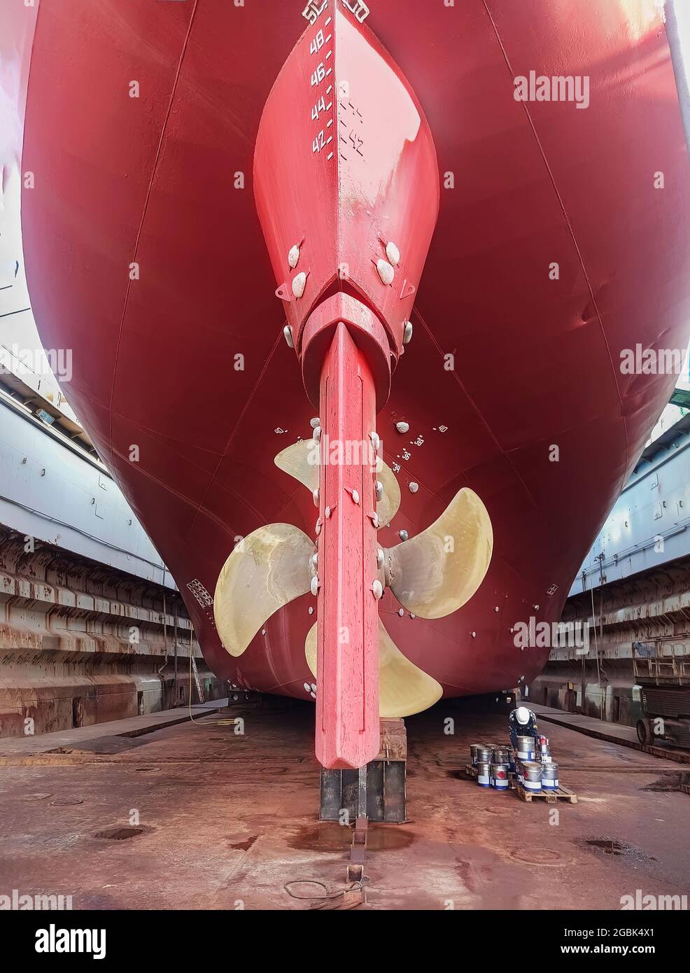 Drycargo ship in dry dock for repairs and maintenance at a shipyard