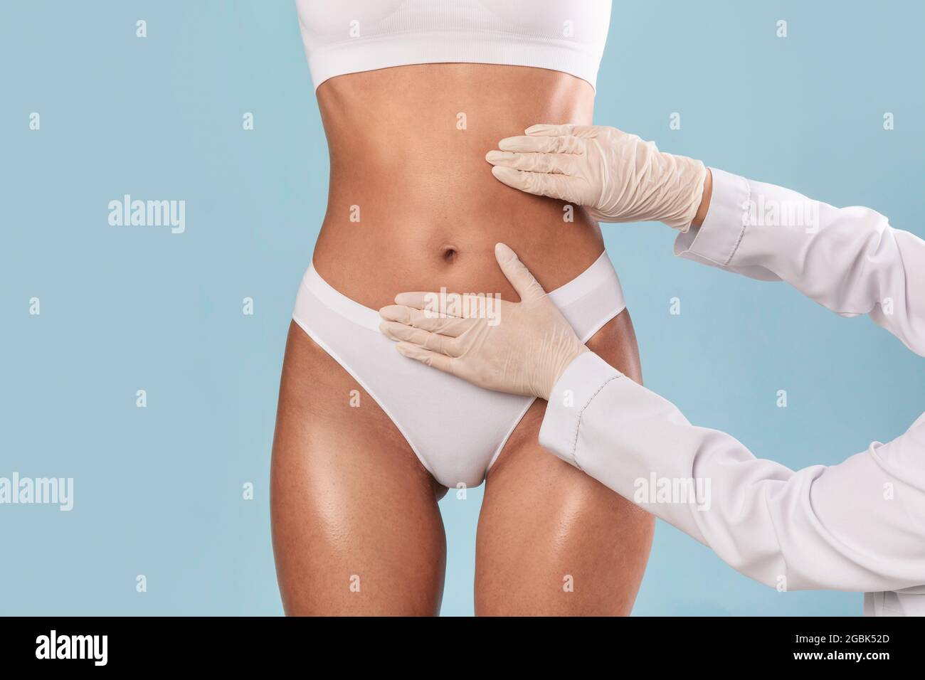 Woman getting consultation at plastic surgery clinic Stock Photo