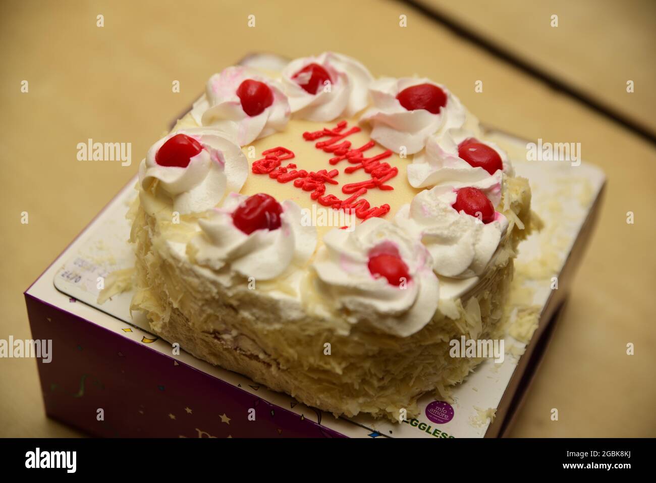 Delicious birthday cake on table close-up Stock Photo