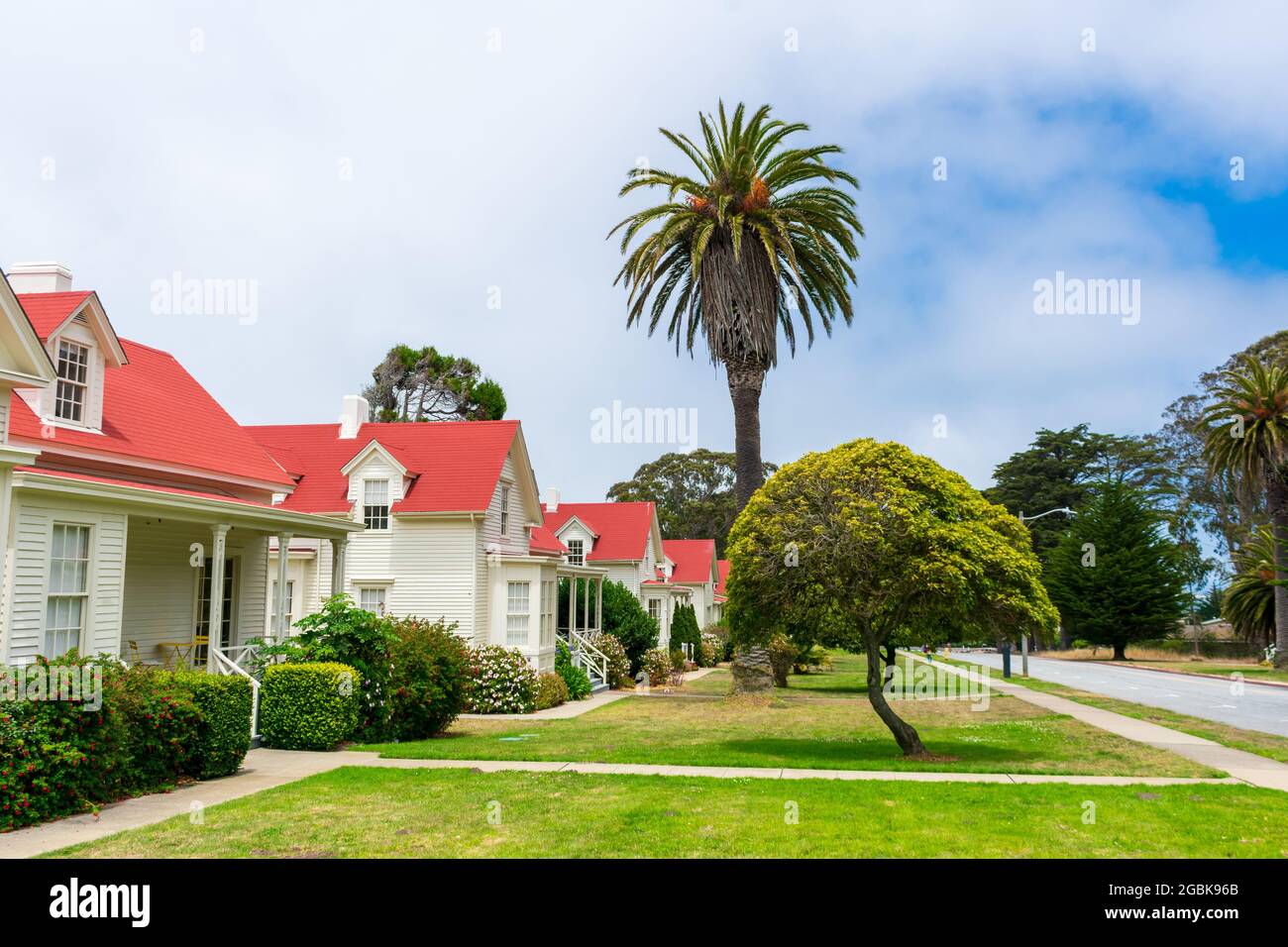 Historic residential homes along green landscape of Funston Avenue at ...