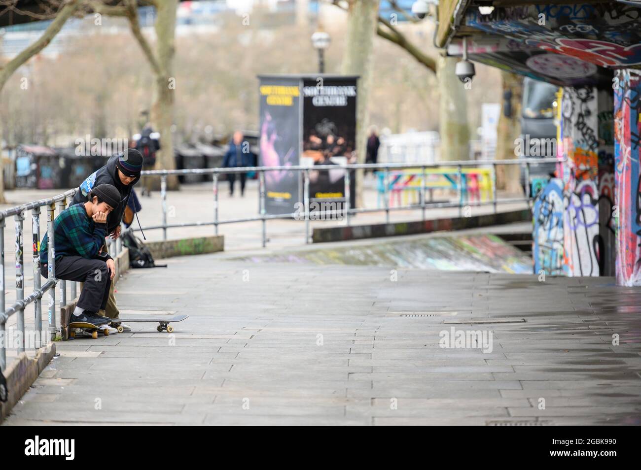 LONDON - MARCH 10, 2020: Friends taking a break from skateboarding at a  skate park on the South Bank of the river Thames, London Stock Photo - Alamy