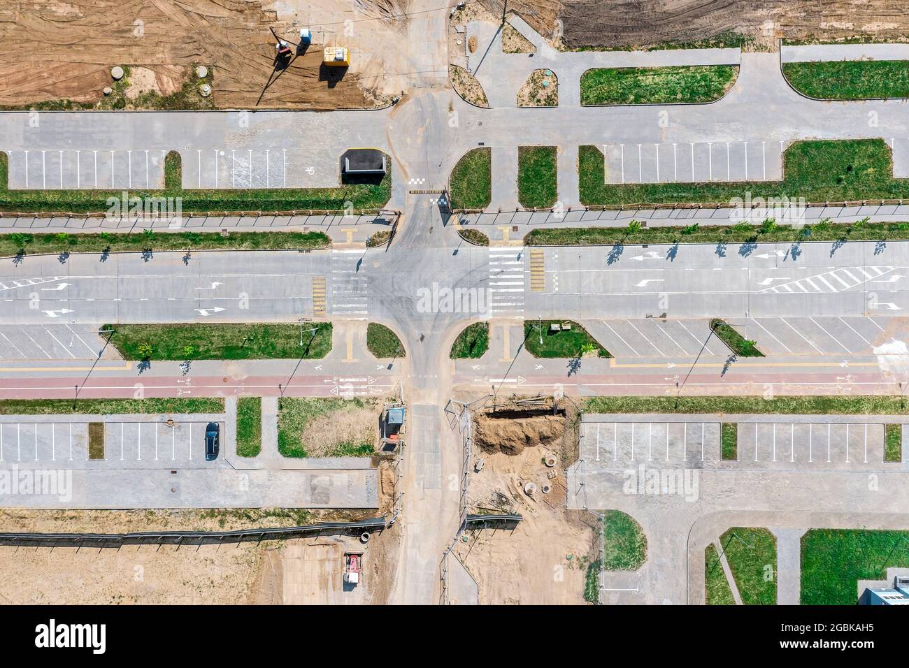 new urban asphalt road under construction. aerial top view in sunny day. Stock Photo