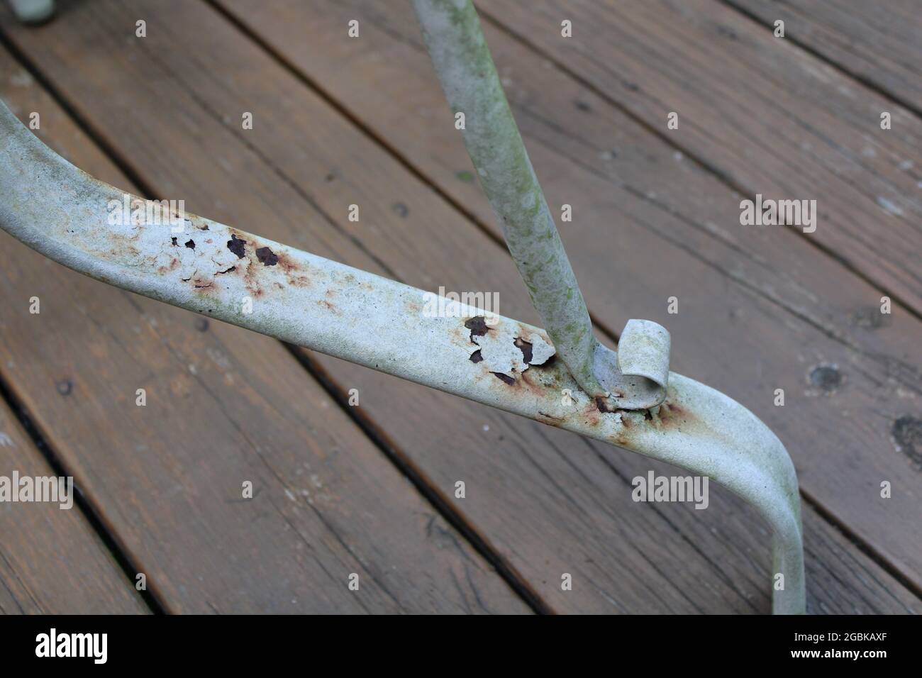 Paint Chipping over Rust Spots on a Metal Table Leg Stock Photo Alamy