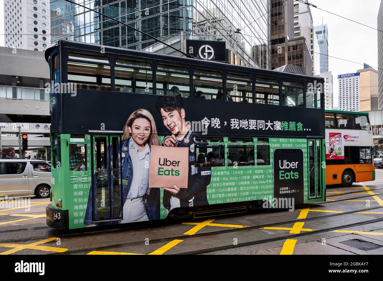 Hong Kong, China. 04th Aug, 2021. A double-deck tram runs covered 