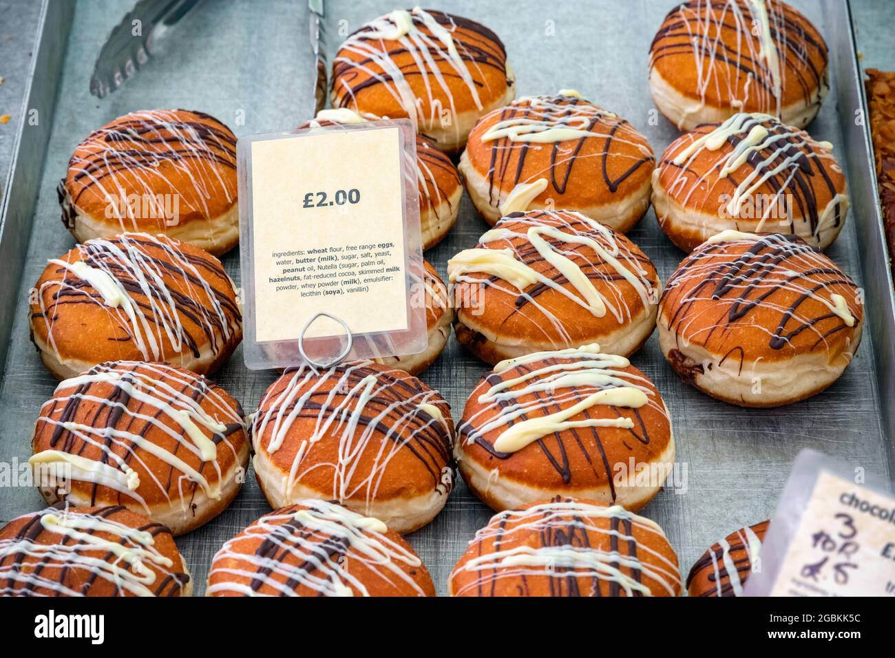 Chocolate berliner, German doughnuts, on display at Broadway market, a